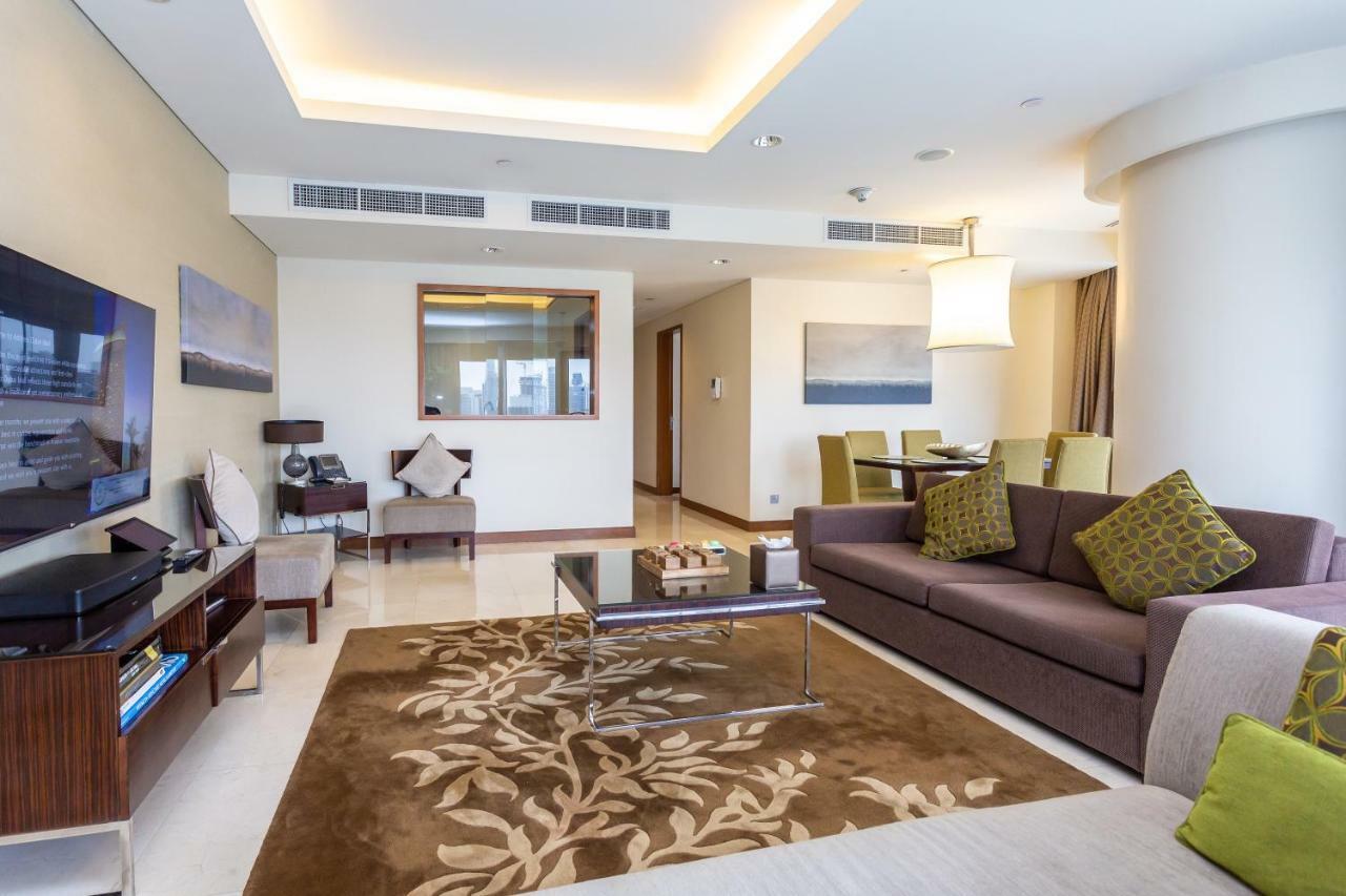 Westminster Dubai Mall Exterior foto A living room in a typical apartment